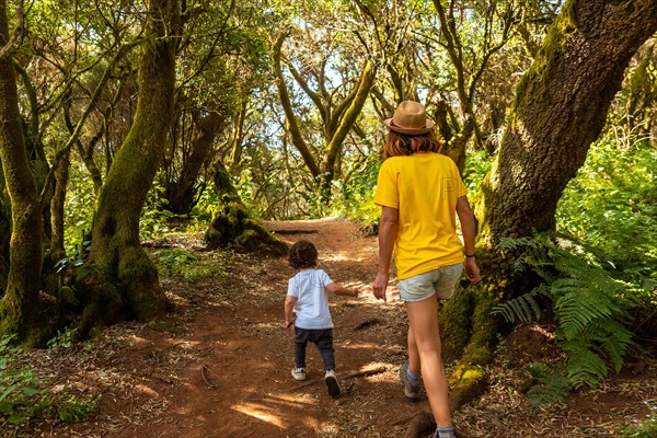 Mother and son walking in La Llania on El Hierro