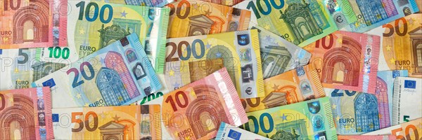 Euro banknotes save money finances background pay pay banknotes panorama in Stuttgart