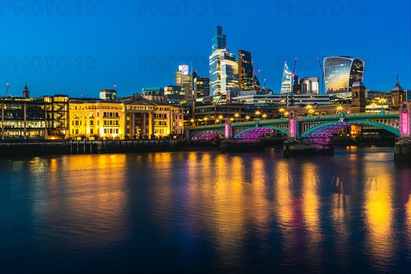 Southwark Bridge ane Skyscrapers over River Thames