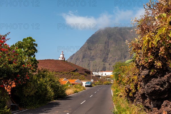 Road next to the Joapira bell tower above the parish church of Nuestra Senora de Candelaria in La Frontera on El Hierro