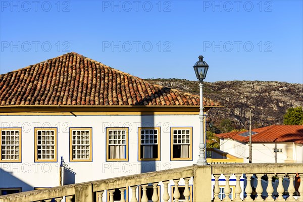 Facade of colorful colonial houses in the historic city of Diamantina in Minas Gerais with the mountain in the background