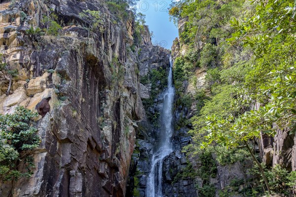 Beautiful waterfall among the rocks on a mountainside in the Serra do Cipo region of the Brazilian Cerrado