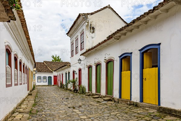 Colorful facades of old colonial-style houses on the cobblestone streets of the historic city of Paraty on the coast of Rio de Janeiro