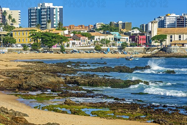 Praia do Rio Vermelho which is known as the bohemian neighborhood of the city of Salvador in Bahia with its rocks