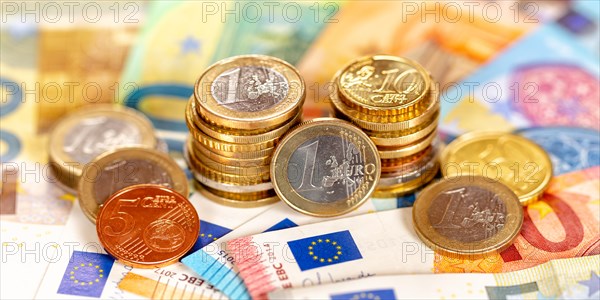 Euro coins and banknotes save money finance pay pay banknotes banner in Stuttgart