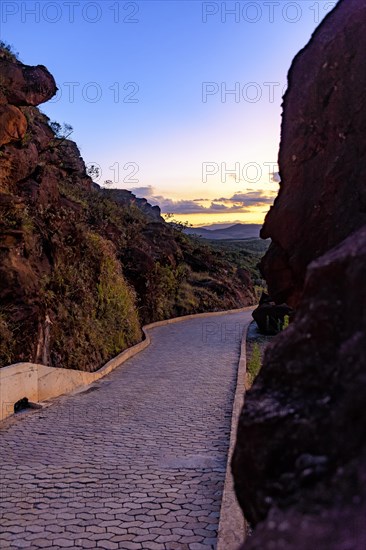 Road between the rocks and mountains of Lavras Novas