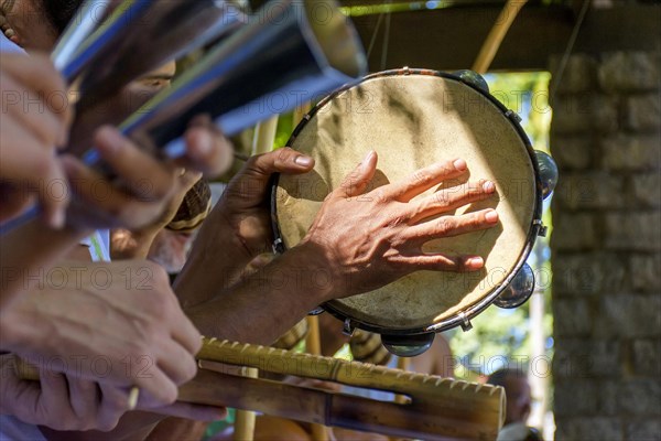 Tambourine and others usually rustics percursion instruments used during capoeira brought from africa and modified by the slaves