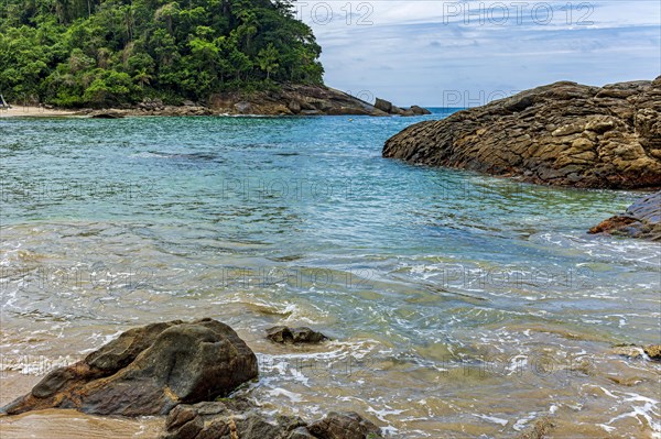 Beach surrounded by rainforest of the tropical paradise of Trindade in Paraty on the coast of Rio de Janeiro