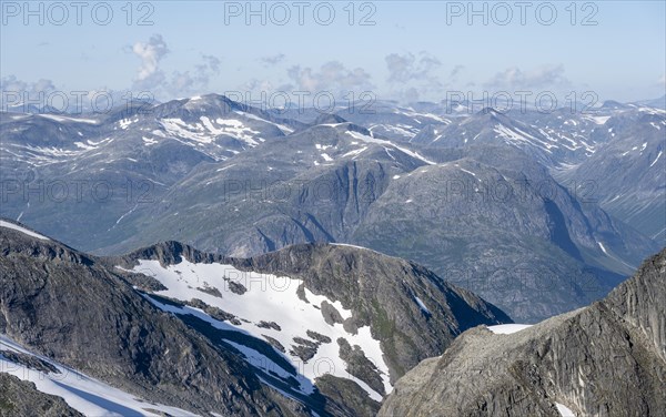 View of rocky mountains with remnants of snow