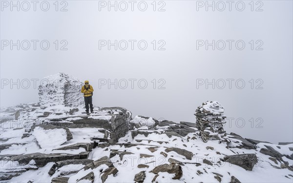 Climbers at the top of Snohetta Mountain