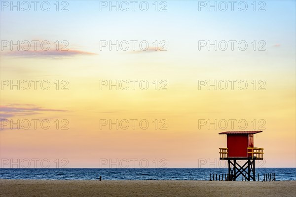 Rescue cabin on Copacabana beach at a tropical sunset on Rio de Janeiro city