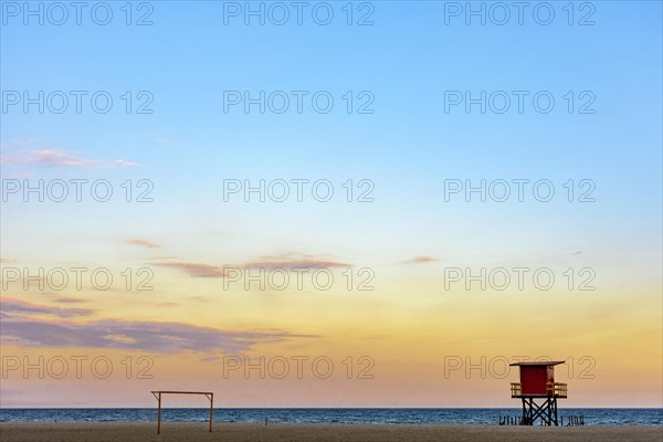 Rescue cabin on Copacabana beach at a tropical sunset on Rio de Janeiro city