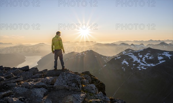 Hiker looking into the sunset