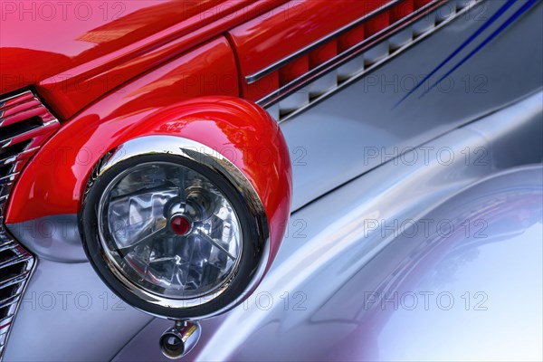 Detail of old red car in perfect condition