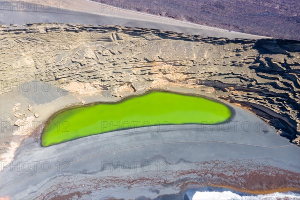 Green lake Charco de Los Clicos Verde near El Golfo in the Canary Islands Aerial view on the island of Lanzarote