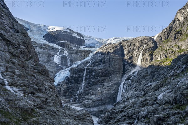 Waterfalls at the glacier tongue Kjenndalsbreen