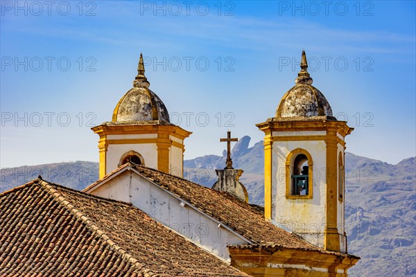 Back view at night of old and historic church in colonial architecture from the 18th century in the city of Ouro Preto in Minas Gerais