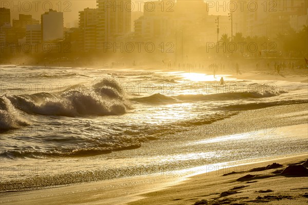 Summer sunset at Ipanema beach in Rio de Janeiro with its sea