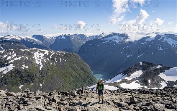 Hikers climbing to the top of Skala