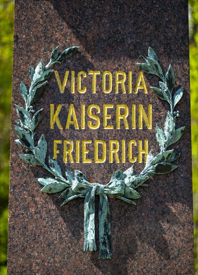 Inscription Victoria Empress Frederick on the plinth of the marble bust for Queen and Empress Victoria in the spa gardens of Bad Homburg vor der Hoehe