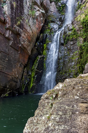 Waterfall inside the natural forest in Cipo hill in Minas Gerais