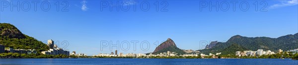 Panoramic image of the famous Rodrigo de Freitas lagoon in Rio de Janeiro surrounded by the city