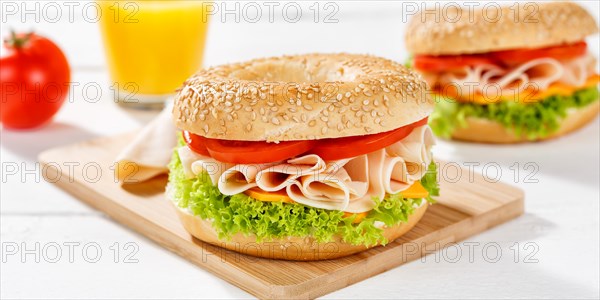 Bagel sandwich for breakfast topped with chicken ham Panorama in Stuttgart