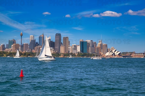 Sailboat in front of Sydney Opera House