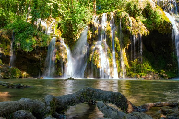 Waterfall illuminated by sun photographed with long exposure