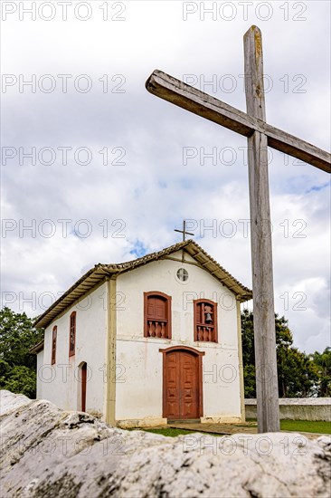 Facade of small historic church 17th century colonial style church in the countryside of Minas Gerais state