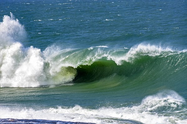 Strong wave breaking hard in the sea waters of Ipanema beach in Rio de Janeiro