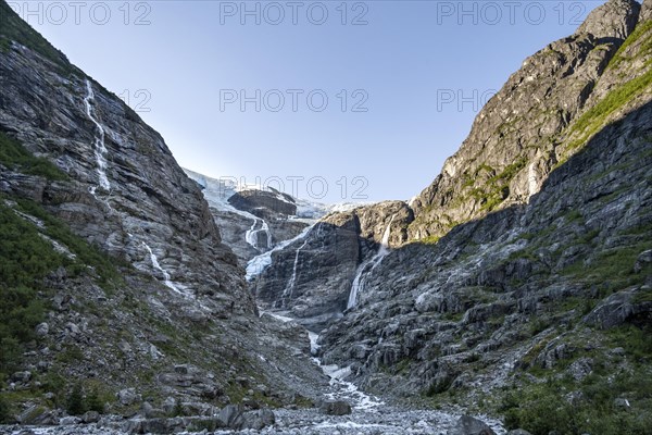 Waterfalls at the glacier tongue Kjenndalsbreen