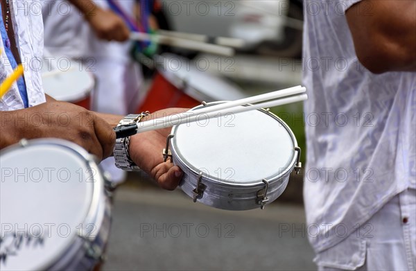 Tambourines being played in the streets of the city of Belo Horizonte during a samba performance at the Brazilian street carnival
