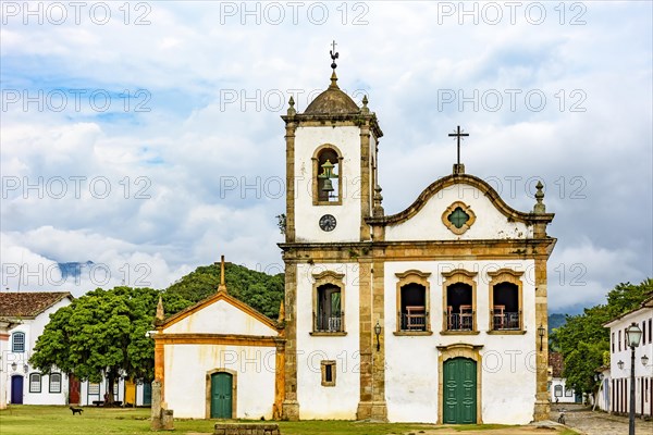 Old streets with historic church facade and houses in colonial architecture in the city of Paraty