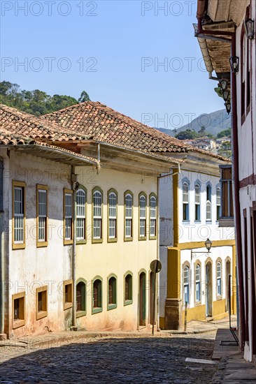 Beautiful street with old colorful houses in colonial architecture