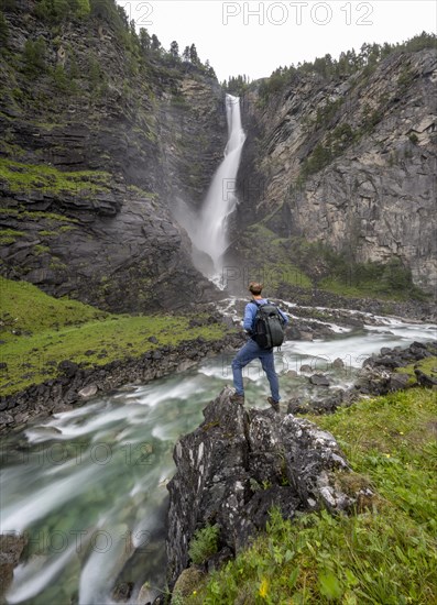 Tourist on a rock