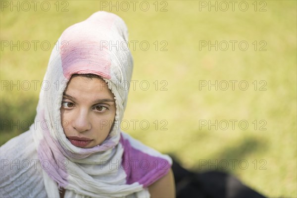 Young hispanic woman doing a funny grimace