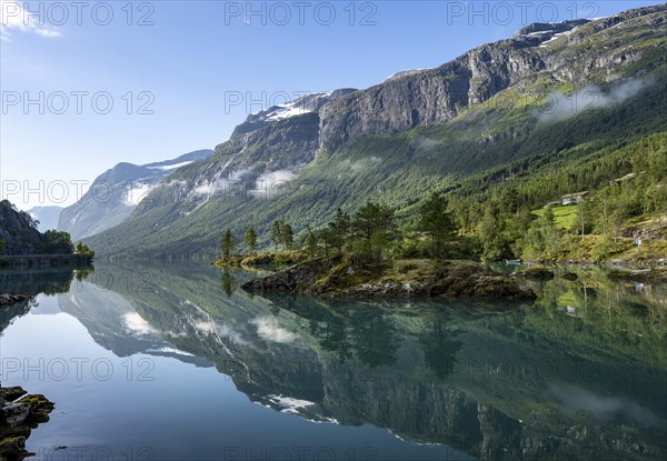 Mountains reflected in blue lake