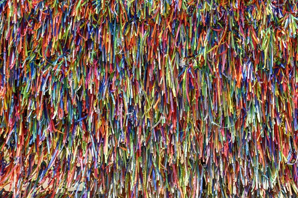 Famous and colorful ribbons of our lord do Bonfim which is believed to bring luck and are traditional in the city of Salvador in Bahia.