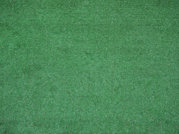 Green synthetic grass texture background