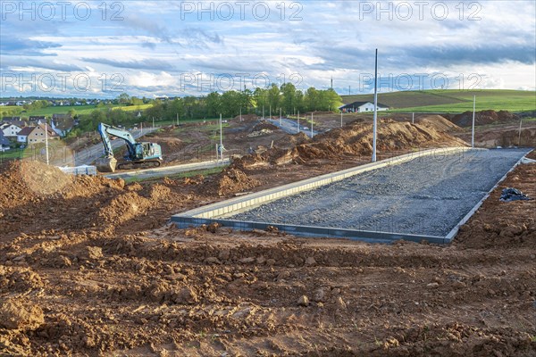 Access roads are being built on a construction site in a new development area