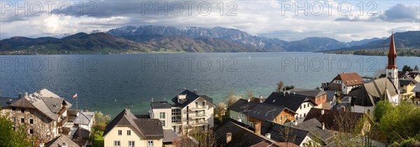 View over the village Attersee am Attersee and the evangnlical church to the lake Attersee