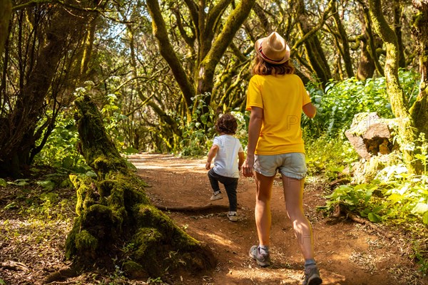 Mother and son walking in La Llania on El Hierro