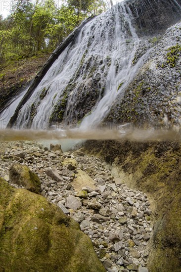 Forest stream with waterfall in the UNESCO World Heritage Beech Forest in the Limestone Alps National Park