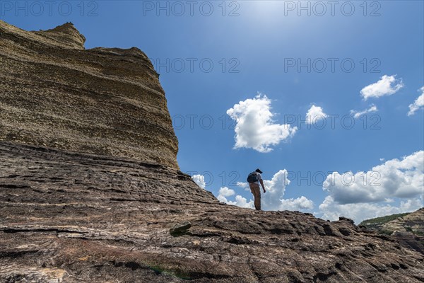 Trekkers in the Sandstone cliffs in the Unesco site Serra da Capivara National Park