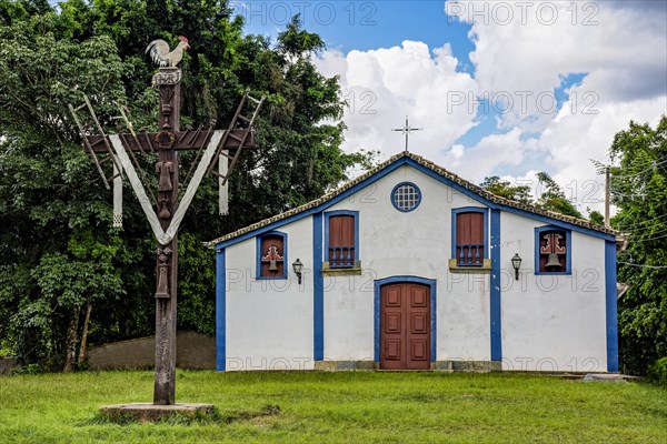 Small historic church amidst the vegetation in the city of Tiradentes in the state of Minas Gerais