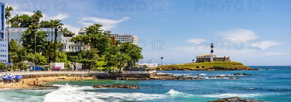 Panoramic view of the city of Salvador in Bahia on a sunny day with the Barra lighthouse