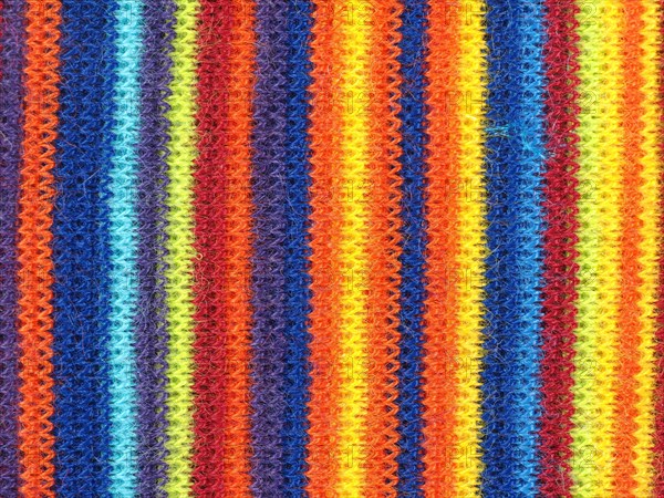 Multicolored vertical stripe fabric background