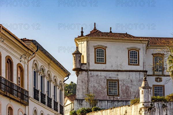 Typical colonial architecture from the time of the empire in the city of Ouro Preto in Minas Gerais with beautiful blue sky in background