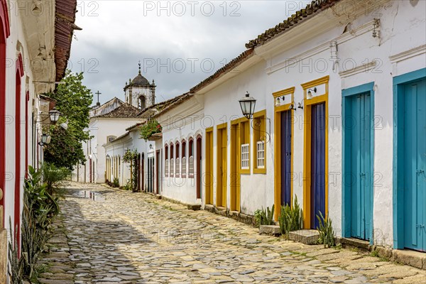 Street of the old city of Paraty with its colorful colonial style houses in the state of Rio de Janeiro